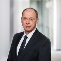BaFin-Exekutivdirektor Dr. Frank Grund sieht für 2023 düstere Wolken am Horizont.