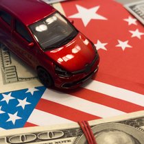 Der Dollar rollt für amerikanische Autoversicherer.